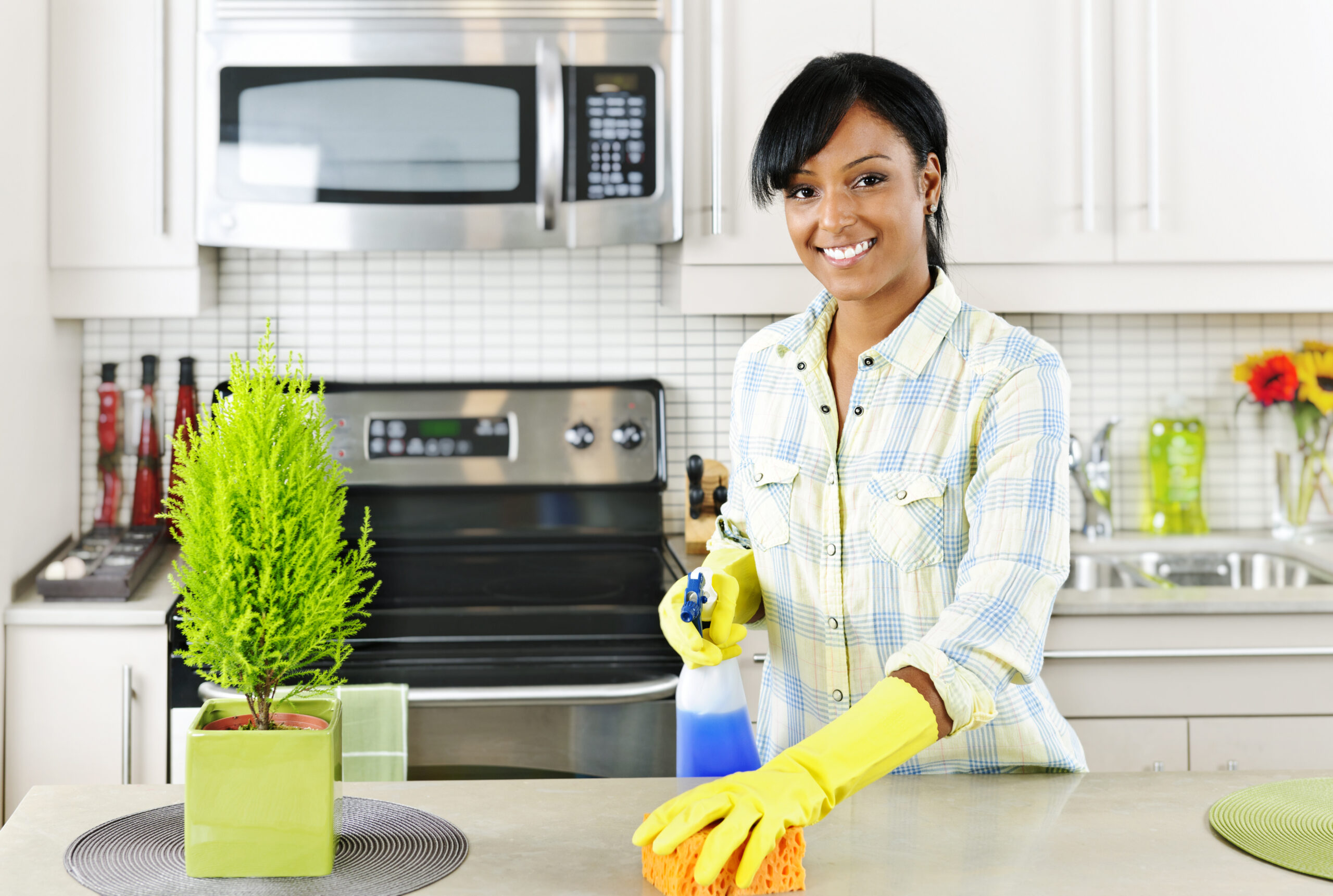 Smiling,Young,Black,Woman,With,Sponge,And,Rubber,Gloves,Cleaning